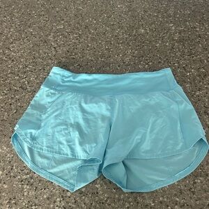 Lululemon Speed-Up Mid-Rise Lined Women’s Shorts 4” in Blue